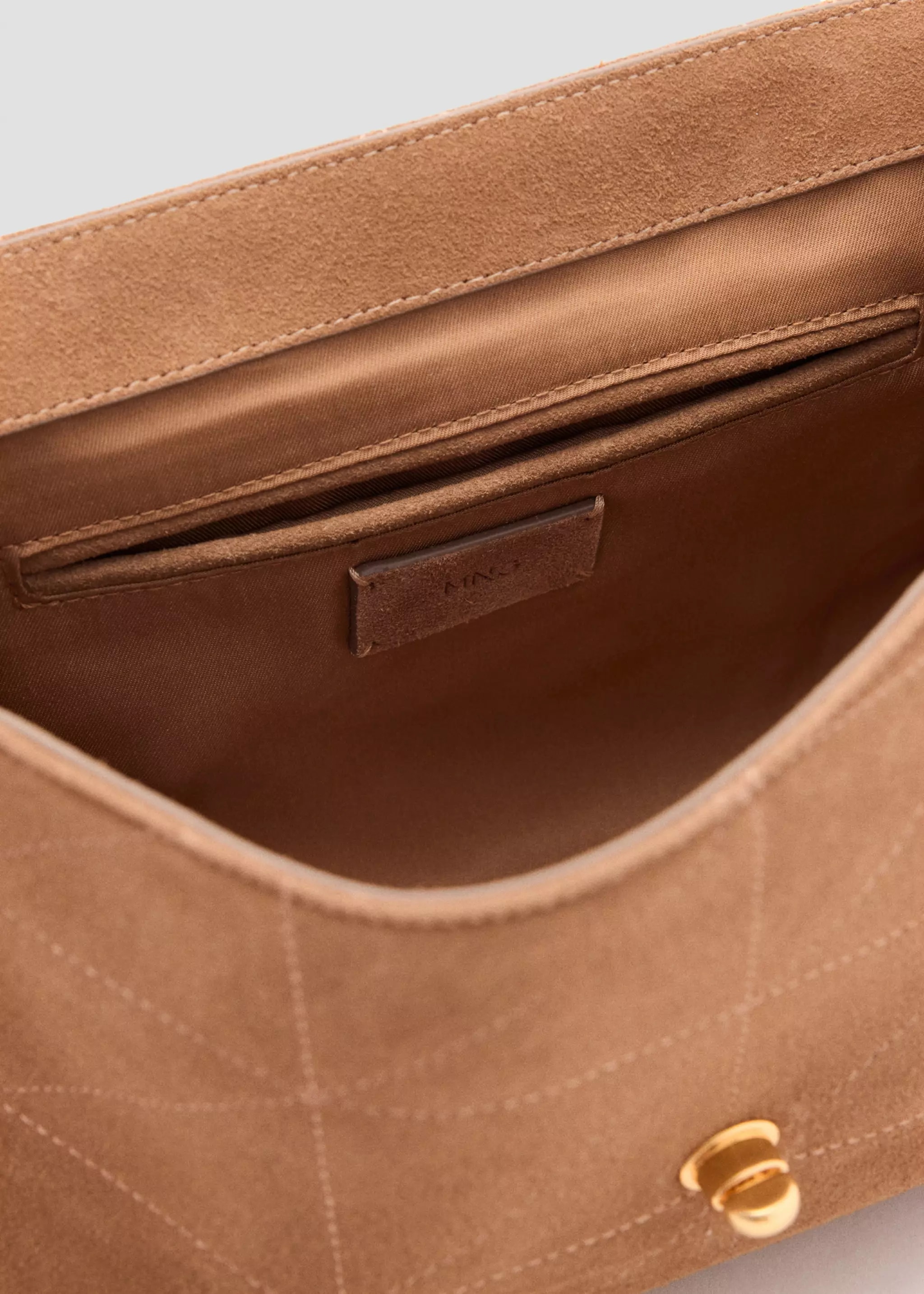 MNG Black Leather Tote Gold Zipper Interior Detail